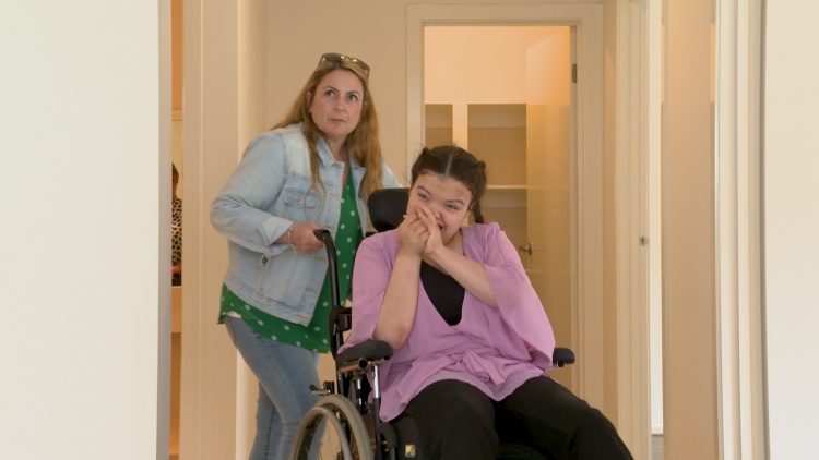 Shania and her mum in her new specialist disability accommodation share house
