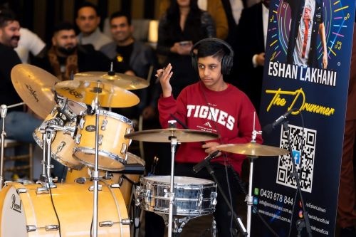 Eshan Lakhani performing the drums live