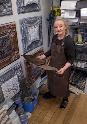 Louise holding her art