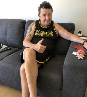 Darryl sitting on the sofa