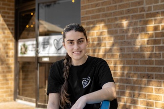 Scarlett Jennings sitting outside a radio station 