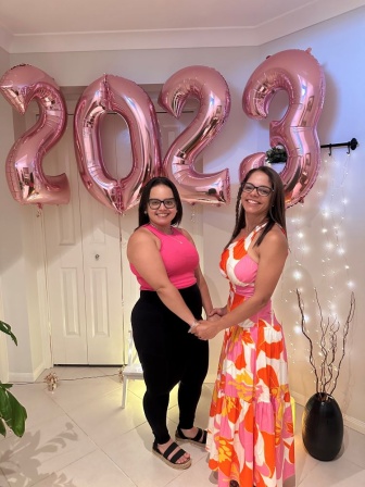 Nat and Laura pose together 
