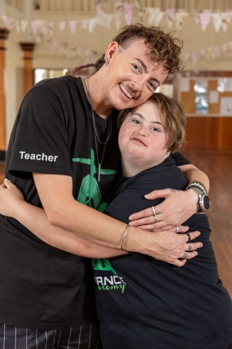 Dom Tulleken with Jazmyn Wilson in dancing ballroom 