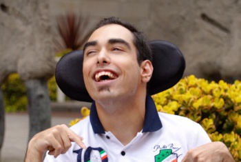 NDIS participant Troy smiling and laughing