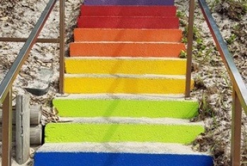 Jack Saunders climbing Rainbow Beach stairs