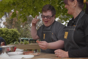 Participants enjoy cooking with 100 Mile Foodie kitchen