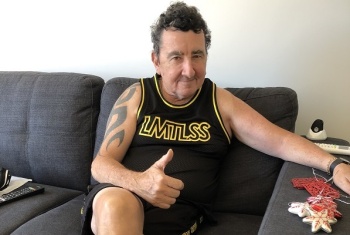 Darryl sitting on the sofa