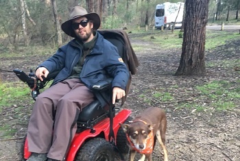 Luke Ogden with his dog