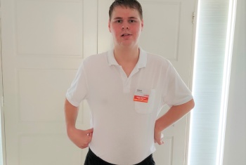 Aidan Bates wearing his uniform and ready to work.