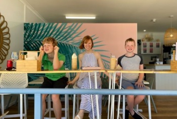 Max Brianna and Freddy Blackett at a cafe